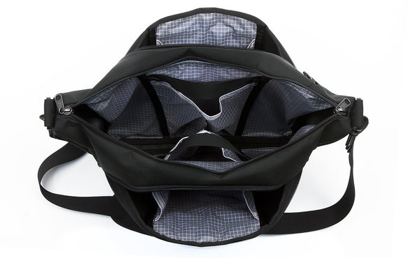 Parental Unit with all compartments open, showing the interior pockets.
